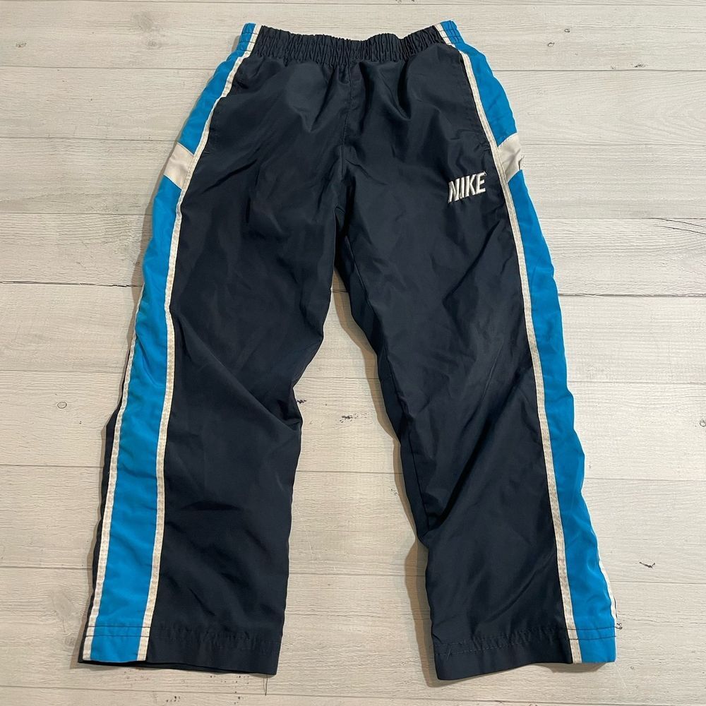 Nike kids blue lined windbreaker‎ pants size 4